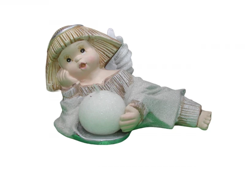 Engel liegend mit Kugelkerze