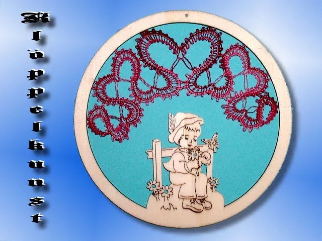 Klöppelbrief für Mobilering mit Figur